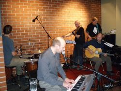 Zhasni na křtu v Café Práh